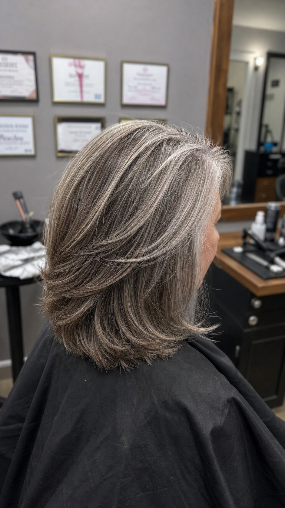 Women's gray blending hair color service at Hair Code in Highlands Ranch
